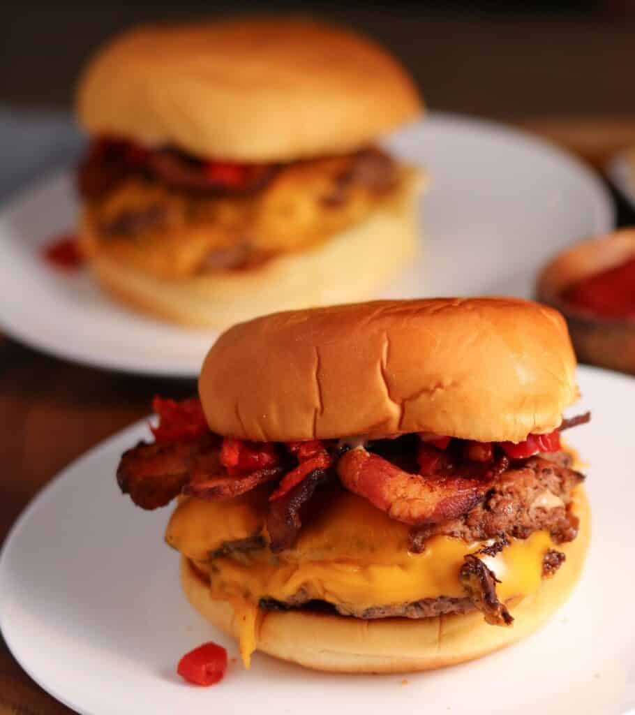 two Shake Shack Double SmokeShack burger copycats on plates