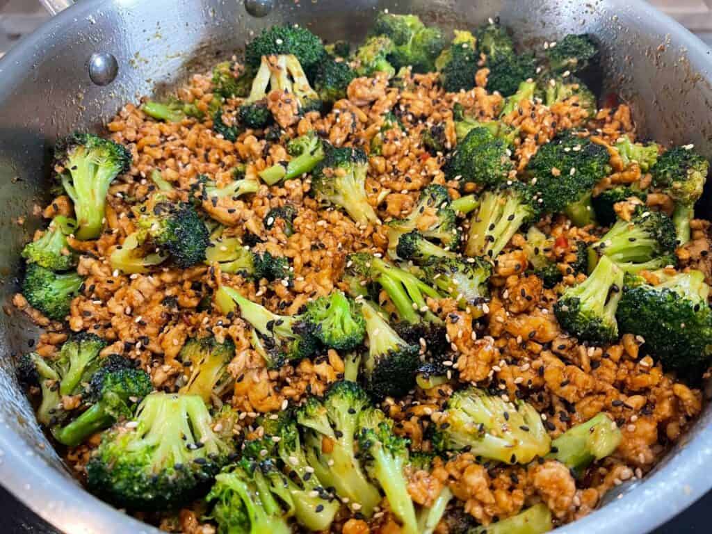 finished ground chicken and broccoli in a sauté pan together