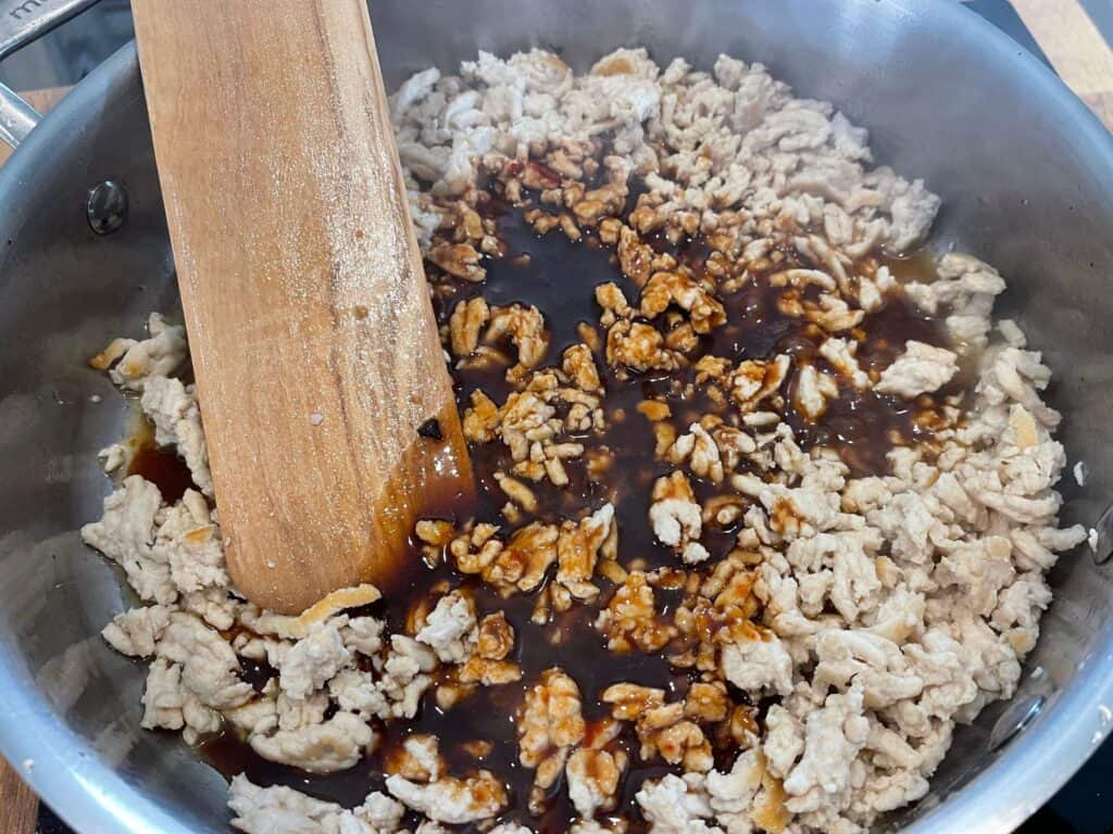 honey sriracha sauce added to the cooked ground chicken