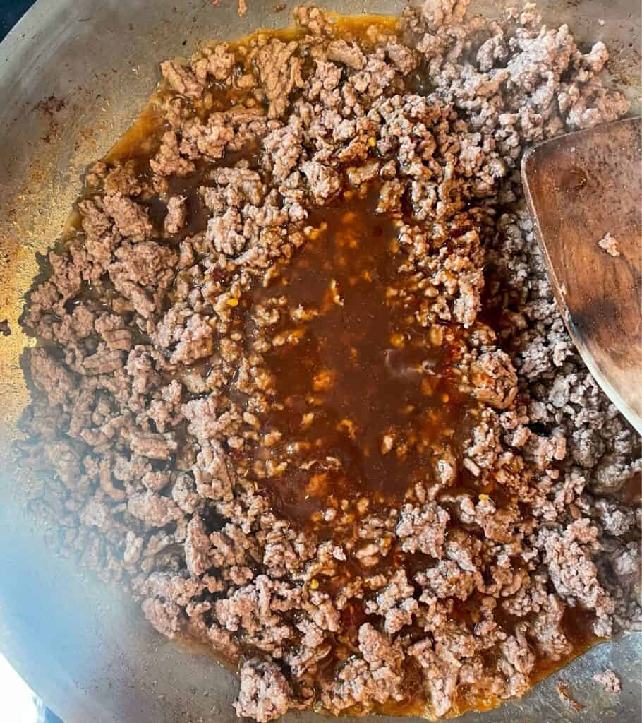 cooked ground beef with the Beijing beef sauce added 