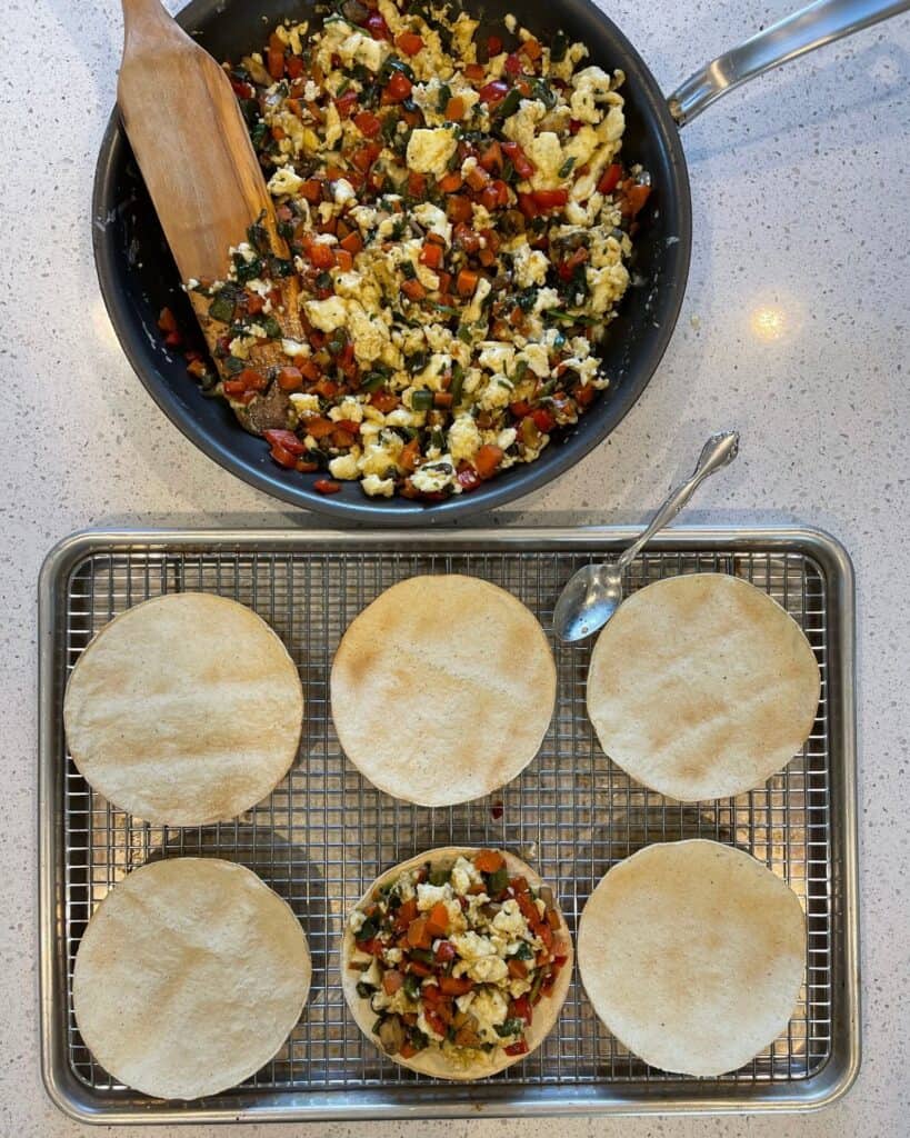 assembling breakfast tostadas