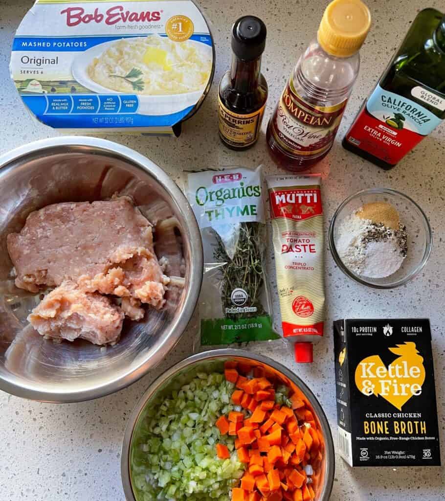 ground chicken, mashed potatoes, and ingredients for chicken shepherd's pie