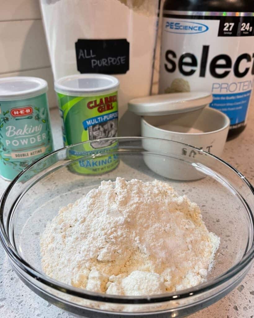 all purpose flour, protein powder, kosher salt, baking powder, and baking soda in a mixing bowl