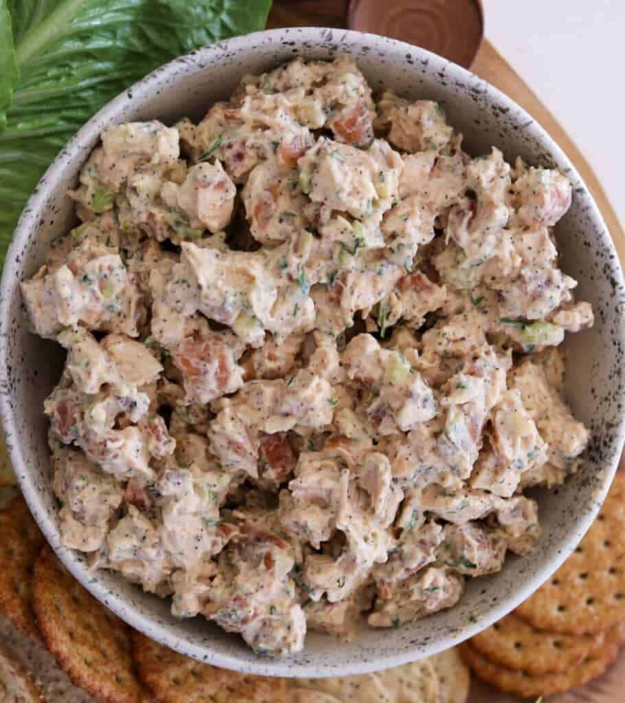 bowl of smoked chicken salad with lettuce and crackers