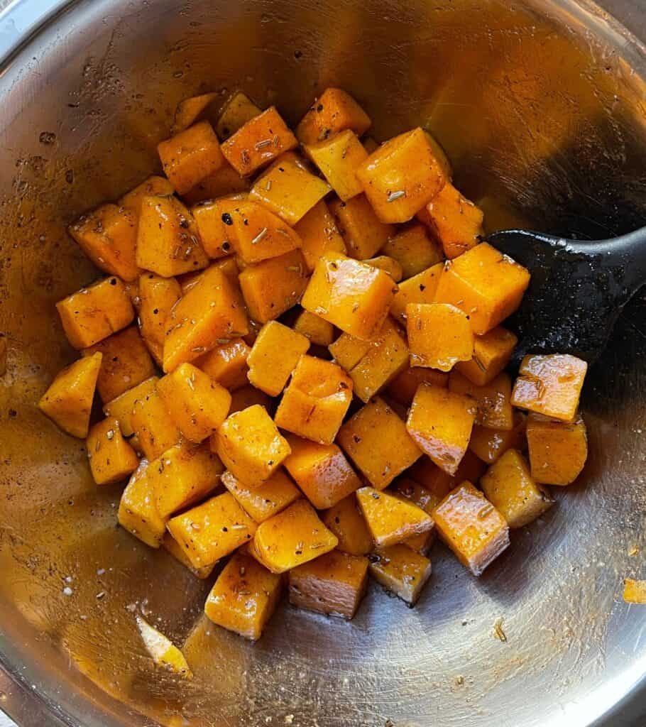 diced butternut squash in a mixing bowl