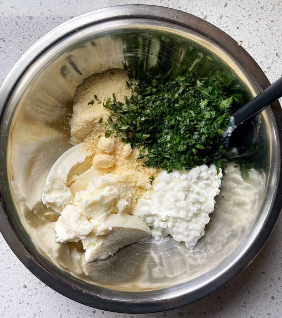 low fat cottage cheese and ricotta, grated parmesan, parsley, and basil