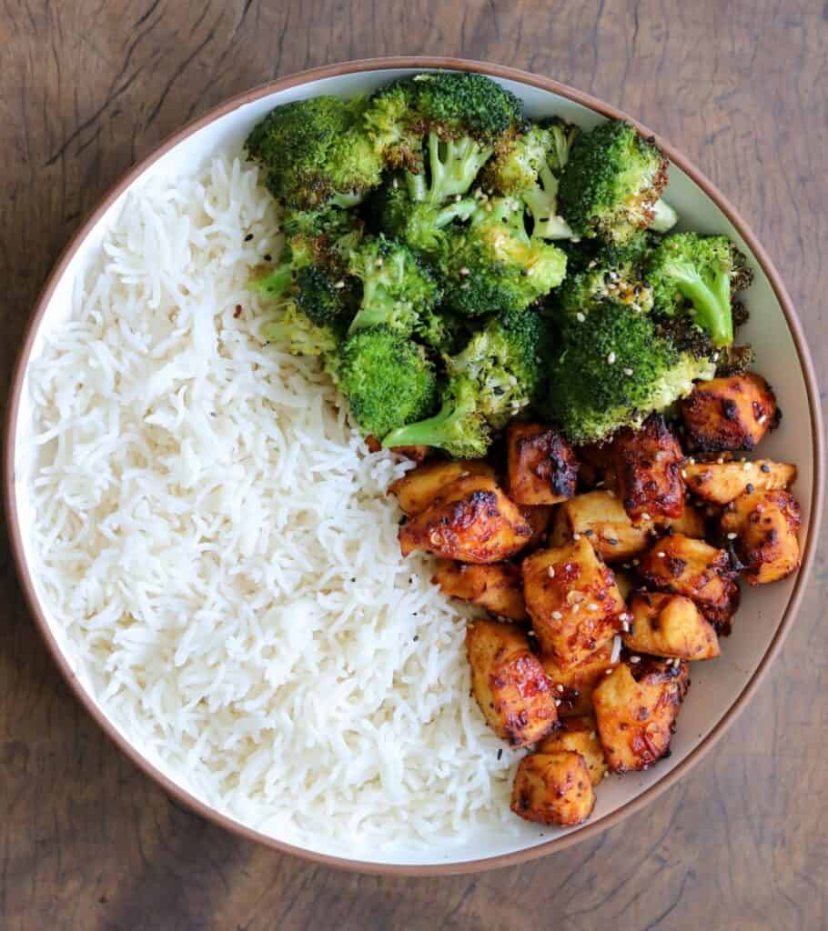 air fryer chicken and broccoli in a bowl with rice