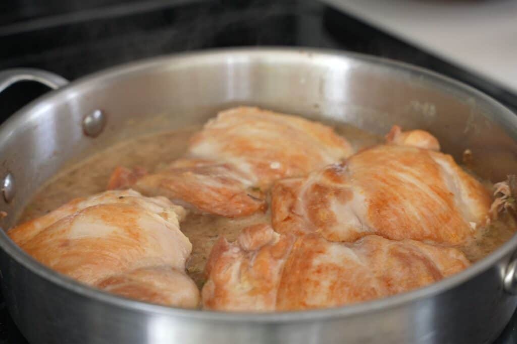braising chicken thighs in a sauté pan