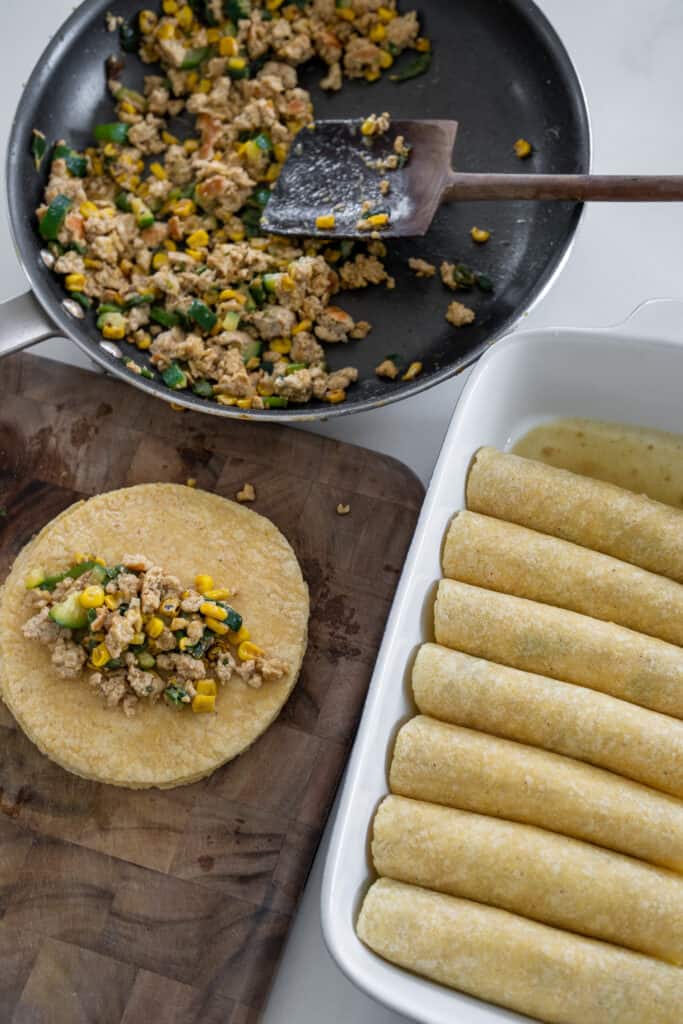 filling corn and flour tortillas with ground turkey and veggies