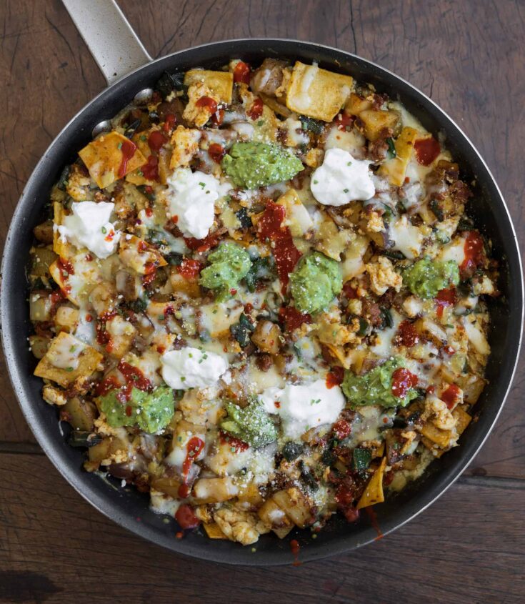 https://masonfit.com/wp-content/uploads/2023/04/breakfast-enchilada-skillet-735x845.jpg