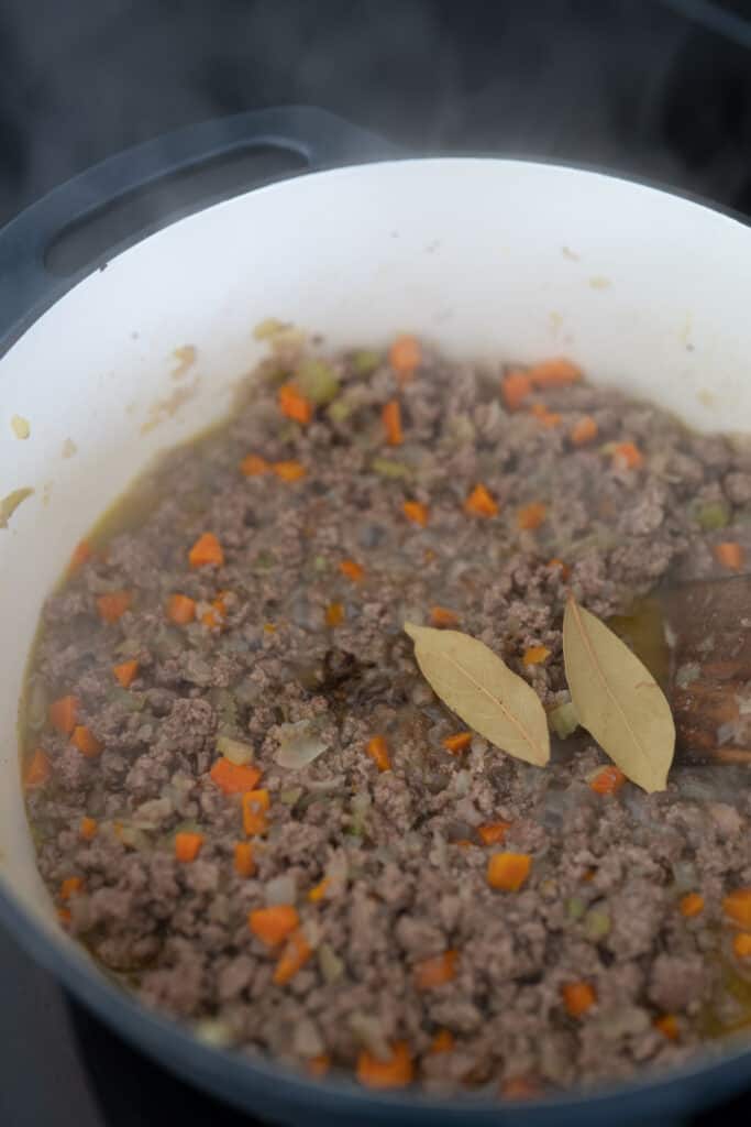 bay leaves added to the meat sauce