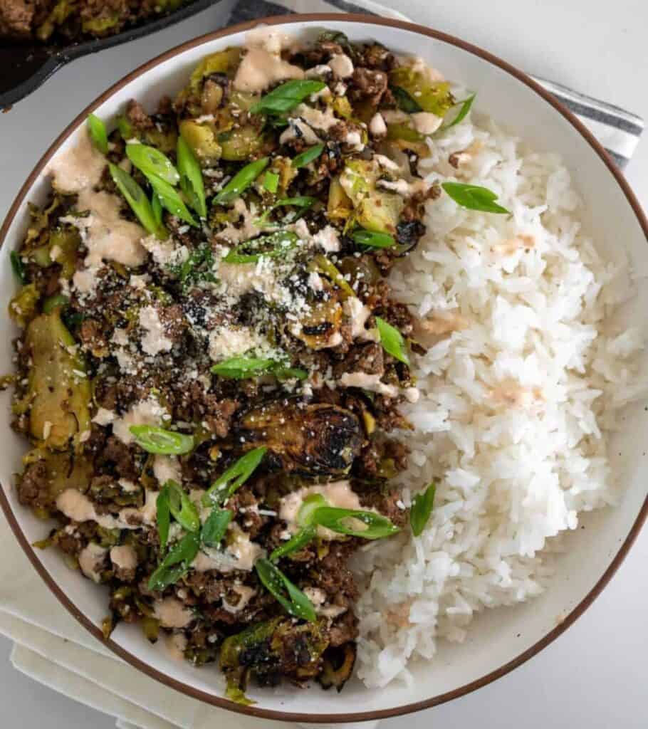 Mexican ground beef power bowl with shaved brussels sprouts and rice