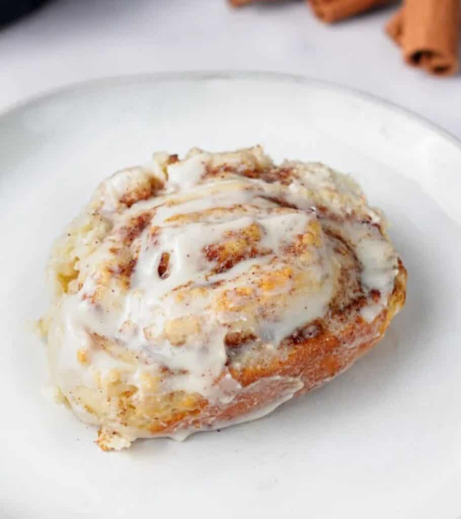 protein cinnamon roll on a white plate