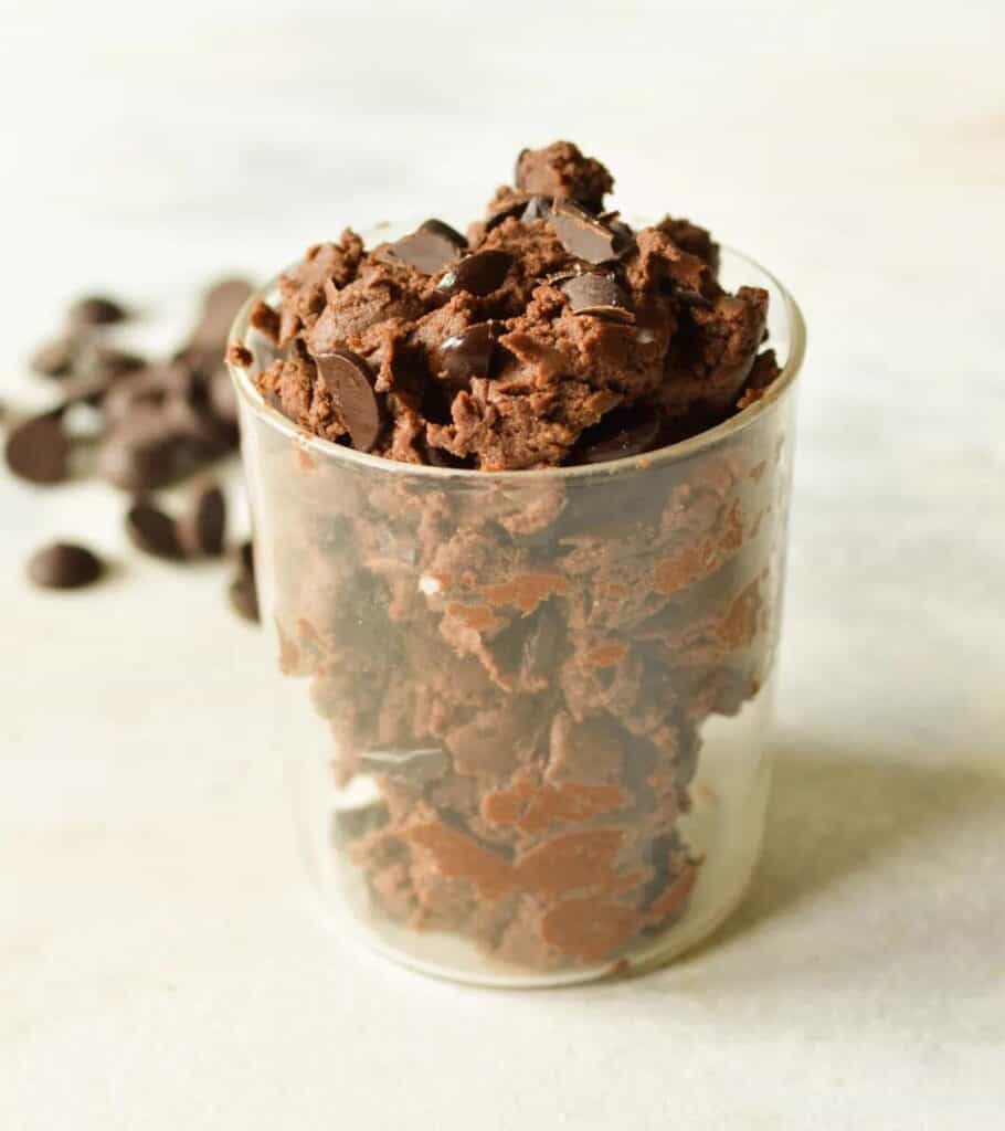 chocolate protein cookie dough in a glass