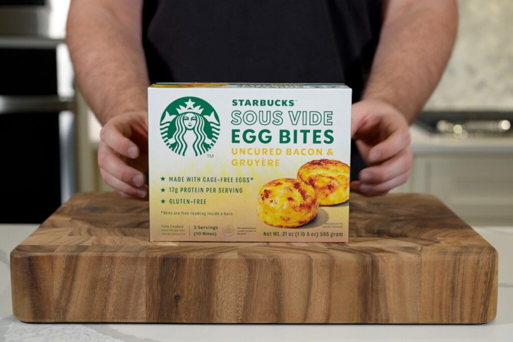 holding a box of Starbucks egg bites from Costco