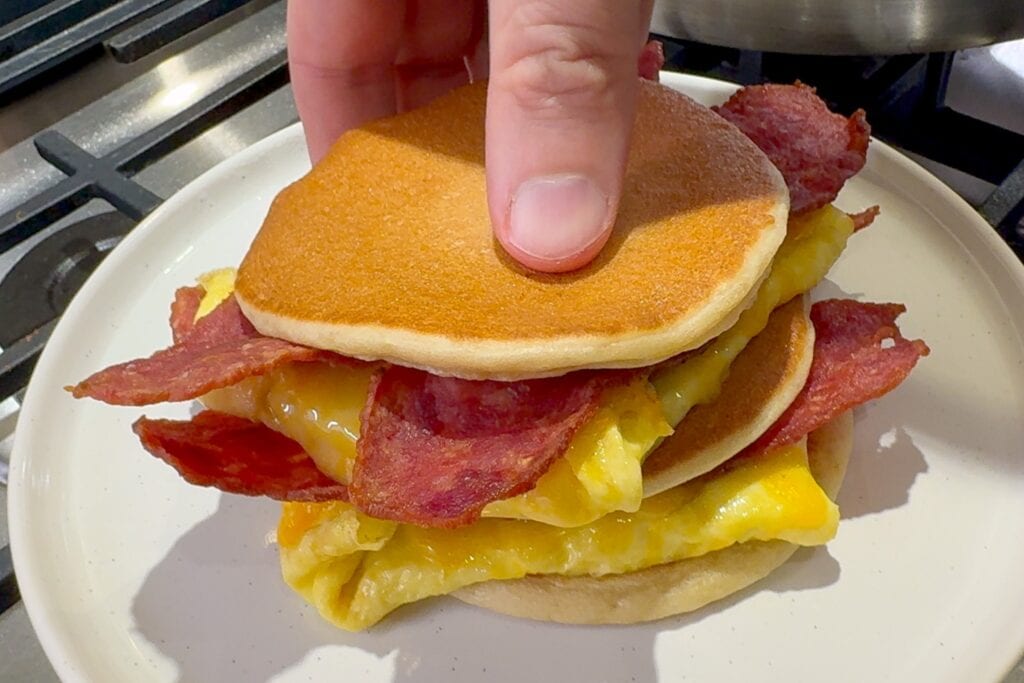 frozen premier protein pancake sandwich with eggs, turkey bacon, and cheese