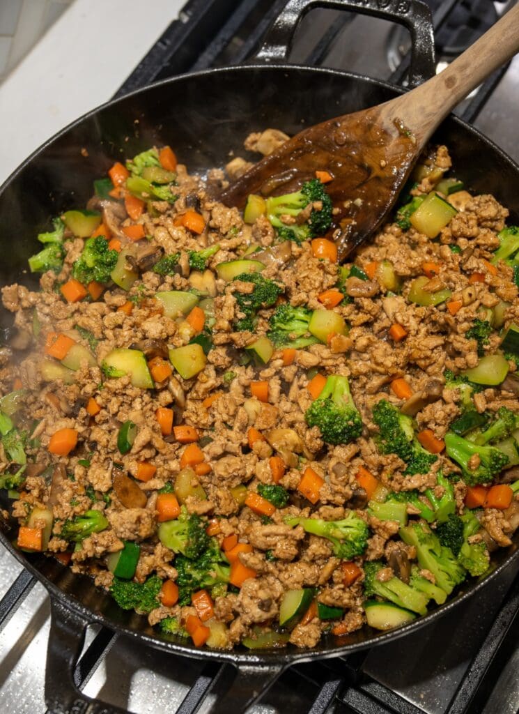 cooked vegetables and ground turkey with teriyaki sauce