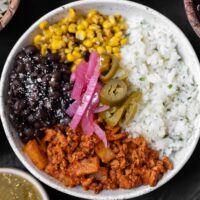 al pastor ground turkey with cilantro lime rice, black beans, corn, pickled onions, and pickled jalapeño peppers