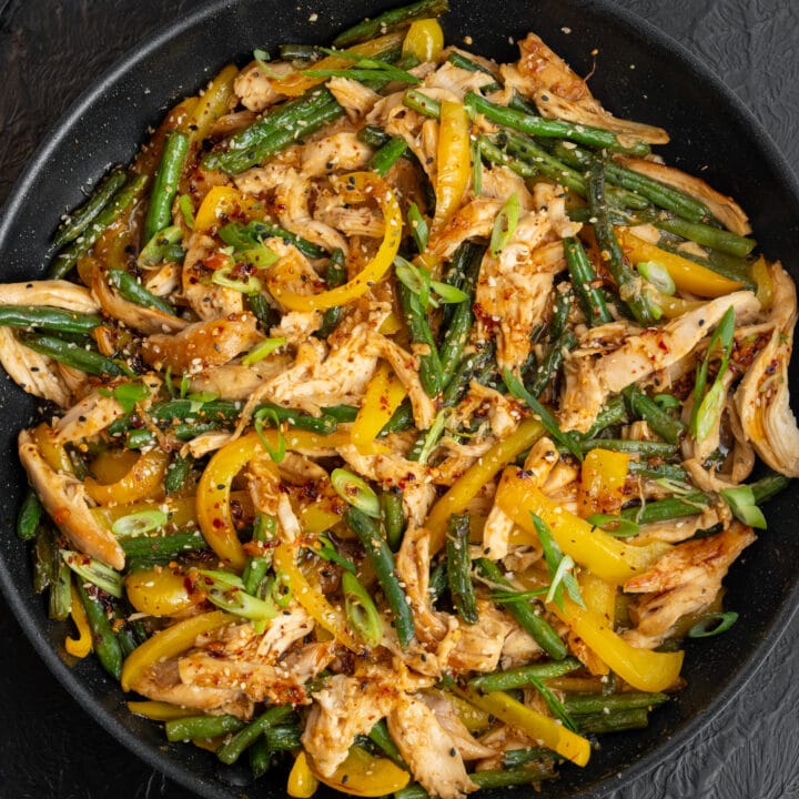 pulled rotisserie chicken stir fry with green beans, bell peppers, and honey sesame sauce
