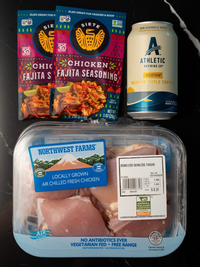 boneless skinless chicken thighs, Siete chicken fajita seasoning, and Athletic Brewing non-alcoholic beer