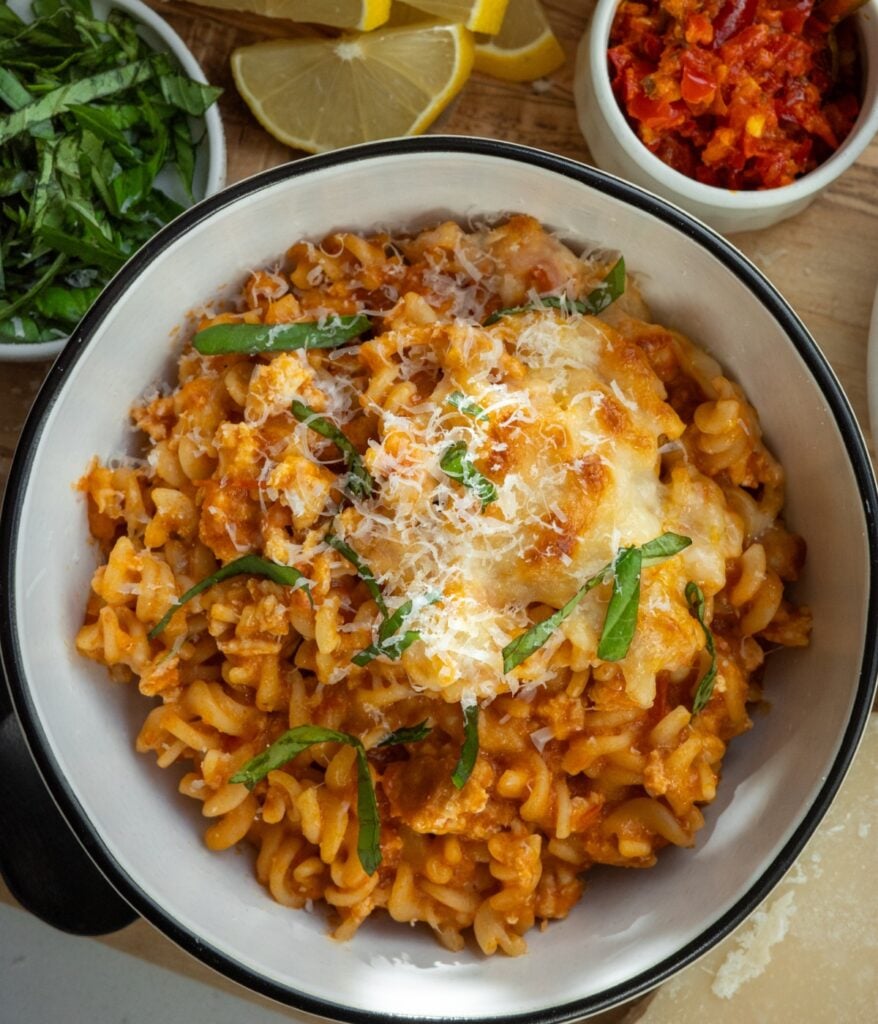 twist my parm Goodles with ground chicken, marinara, and melted cheese