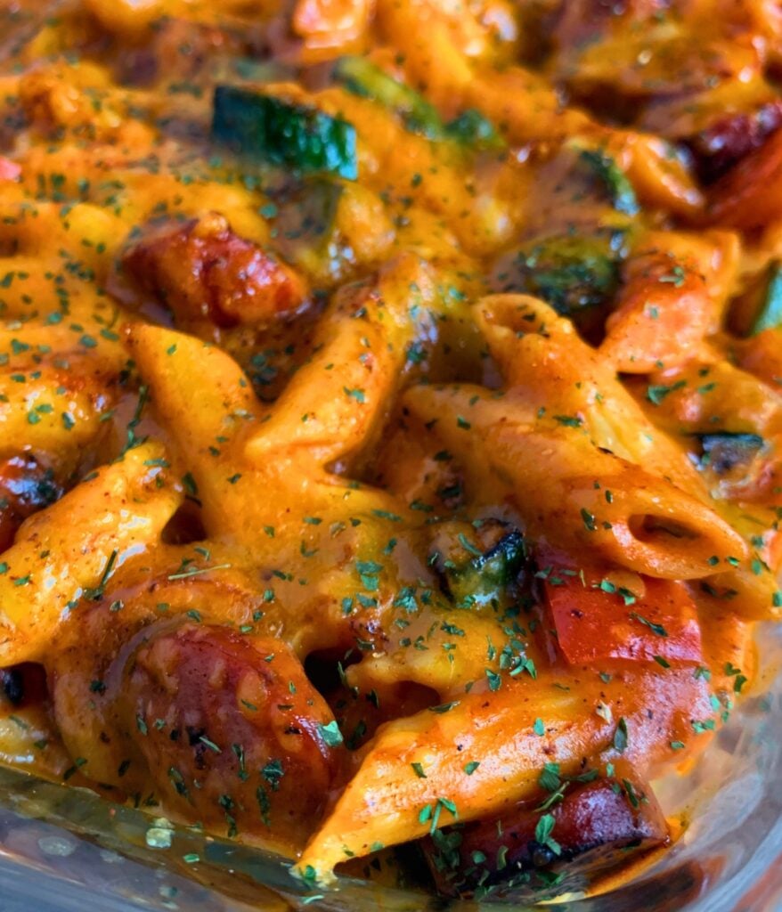 sliced turkey sausage, bell pepper, and zucchini with penne pasta in cajun sauce with cheese