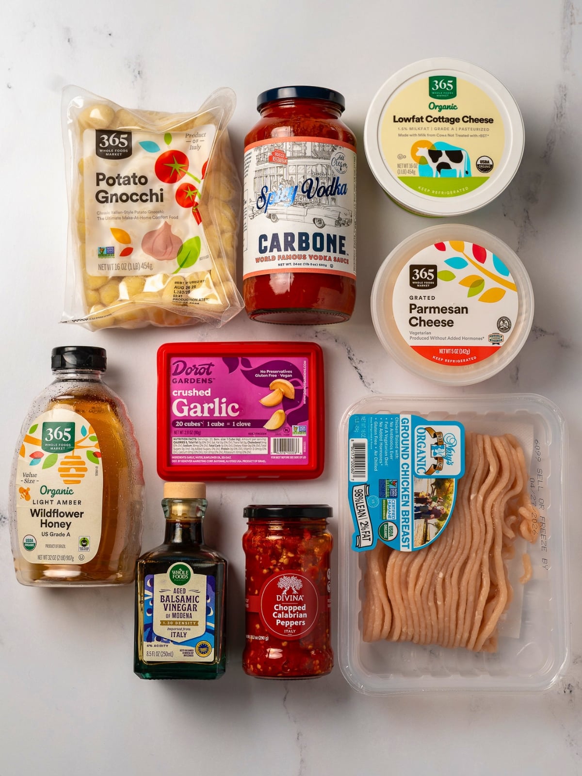 potato gnocchi, Carbone spicy vodka sauce, low fat cottage cheese, grated parmesan cheese, honey, frozen crushed garlic cubes, balsamic vinegar, chopped Calabrian chili peppers, and ground chicken breast