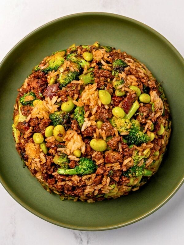 broccoli and ground beef fried rice in a green bowl