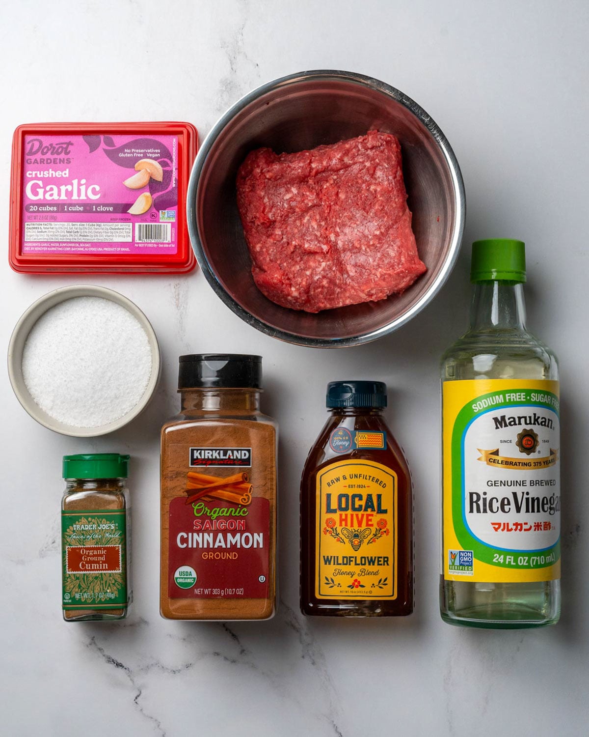 frozen crushed garlic cubes, extra lean ground beef, kosher salt, ground cinnamon, ground cumin, honey, and rice vinegar