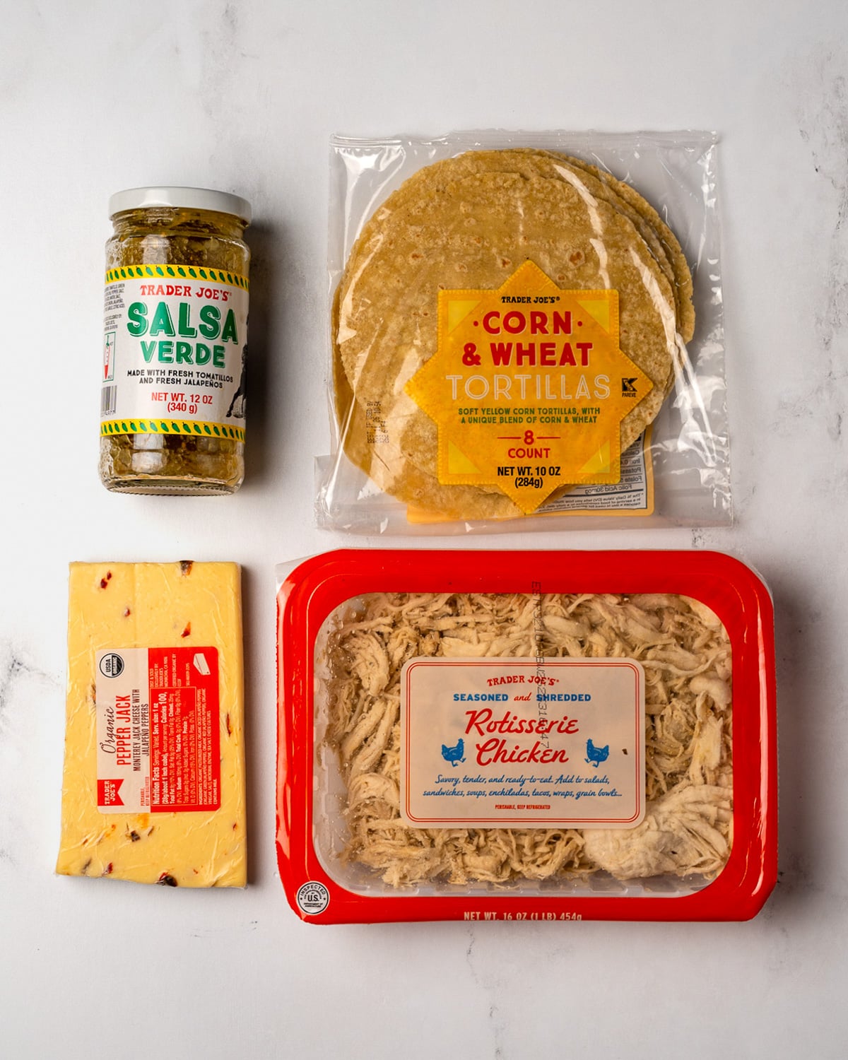 Trader Joe's rotisserie chicken, corn and wheat tortillas, salsa verde, and pepper jack cheese