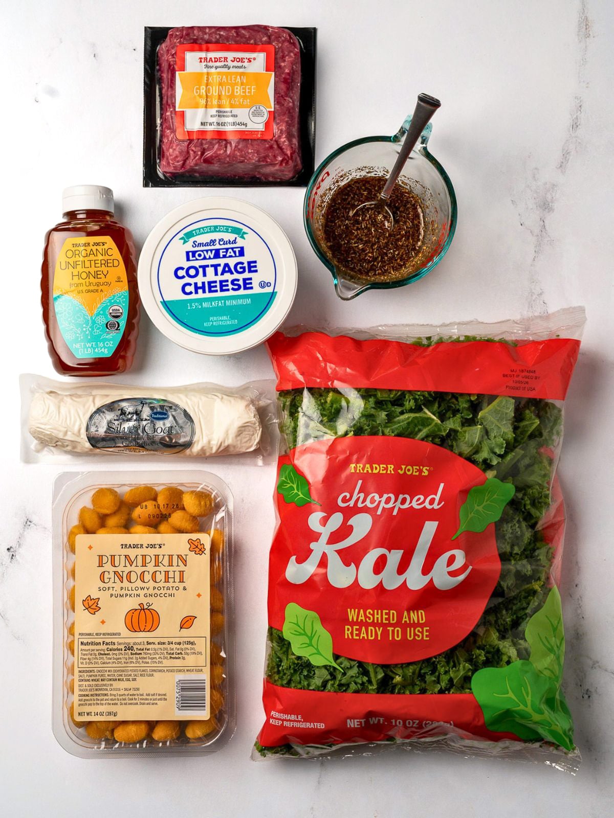 chopped kale, whipped goat cheese ingredients, maple balsamic sauce, extra lean ground beef, and pumpkin gnocchi from Trader Joe's