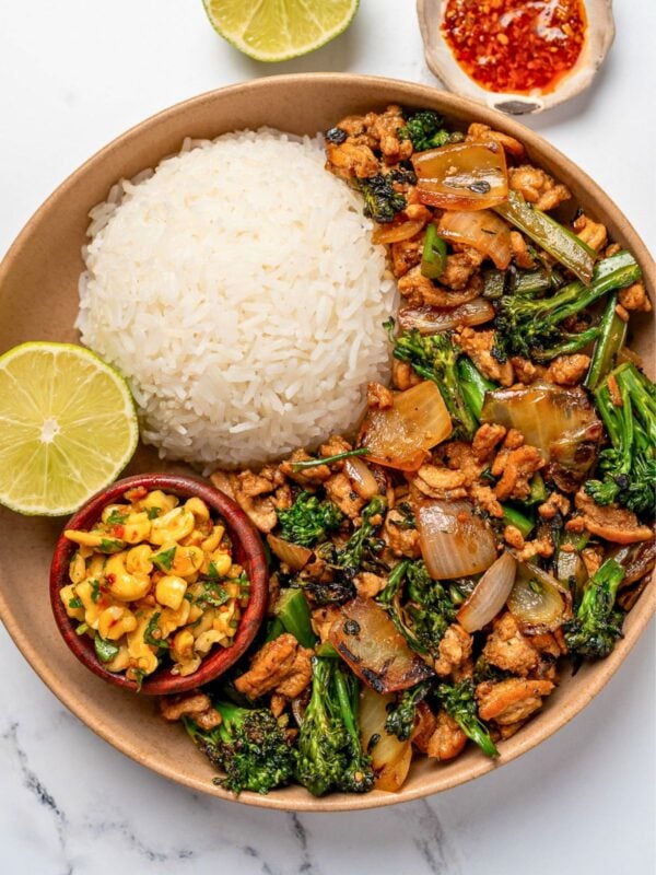 sticky ginger ground turkey stir fry with steamed rice, lime, and a bowl of cashew crunch